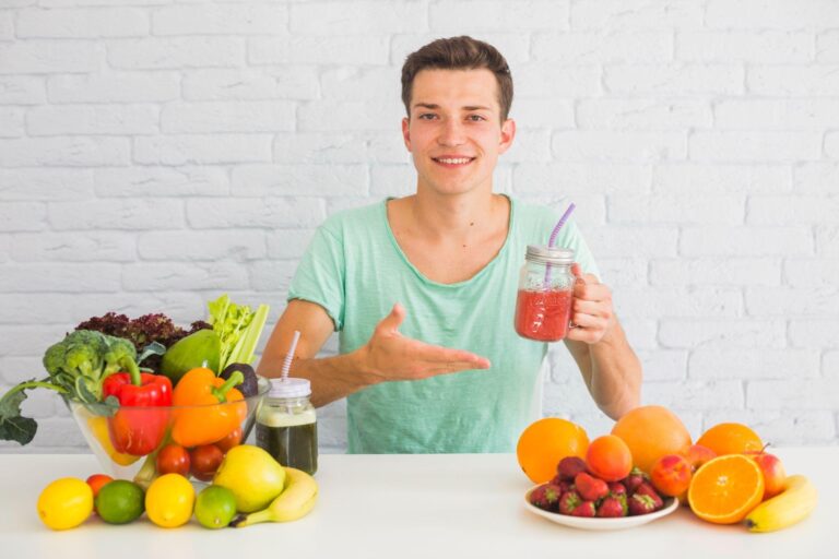 Man sitting at a table with healthy Indian food, representing balanced diet habits and energy-boosting nutrition.
